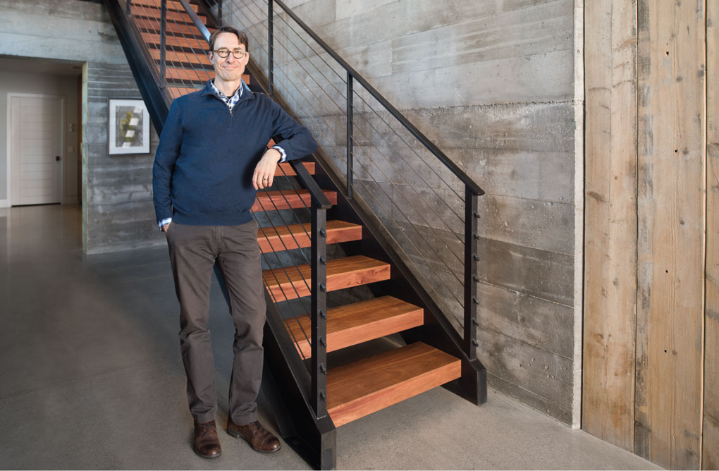 Mark Larson Stands by the Staircase of the Buckeye Point Project