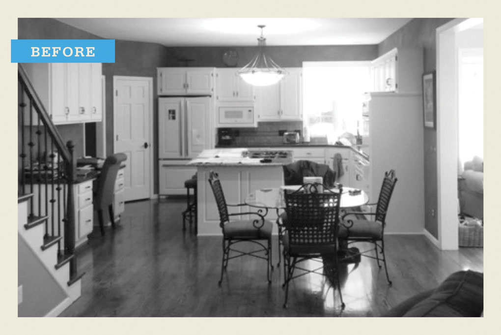 A black and white "before" photo of a kitchen before being remodeled.