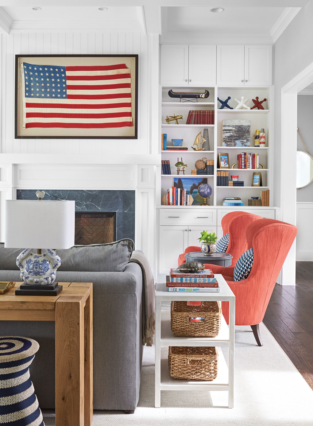 The centerpiece in this Lake Minnetonka home living room is a framed 48-star American flag over the fireplace.