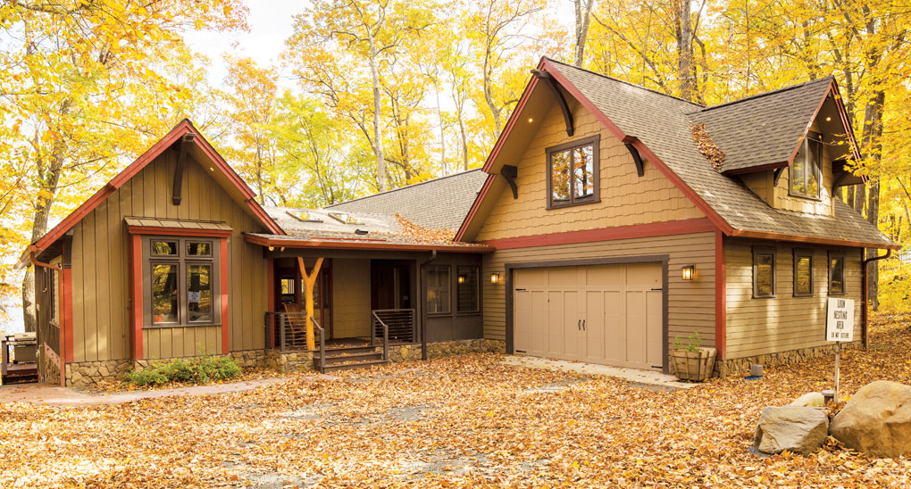 The "after" photo of a cabin exterior in Luck, Wisconsin.