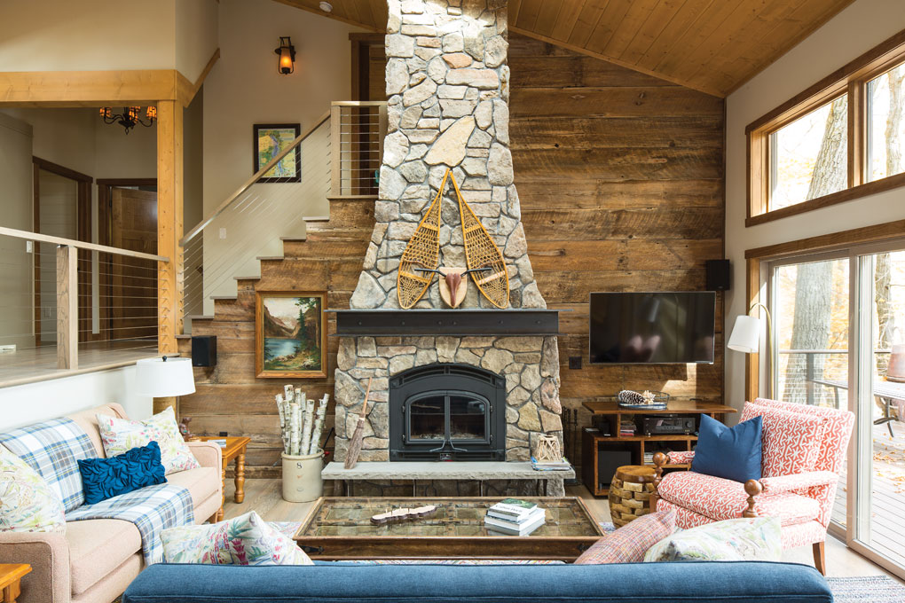 A remodeled living room by Peterssen Keller Architecture and KOR Interior Design at a cabin in Luck, Wisconsin.