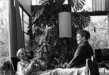Charles and Ray laughing together in the #Eames House living room.