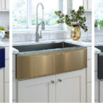 Three sinks, each with a changeable apron by Elkay (blue, black and gold).