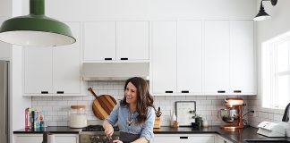 Melissa Coleman’s kitchen features neatly organized drawers and minimal cabinets with notches in place of pulls.