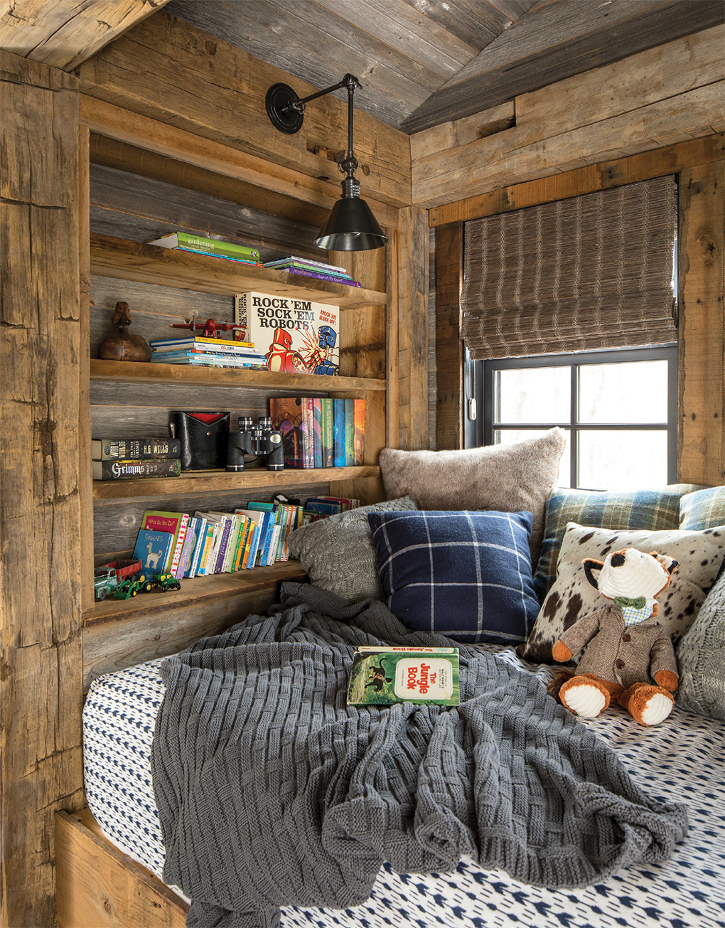 This nook is a snug hideaway for reading or napping.