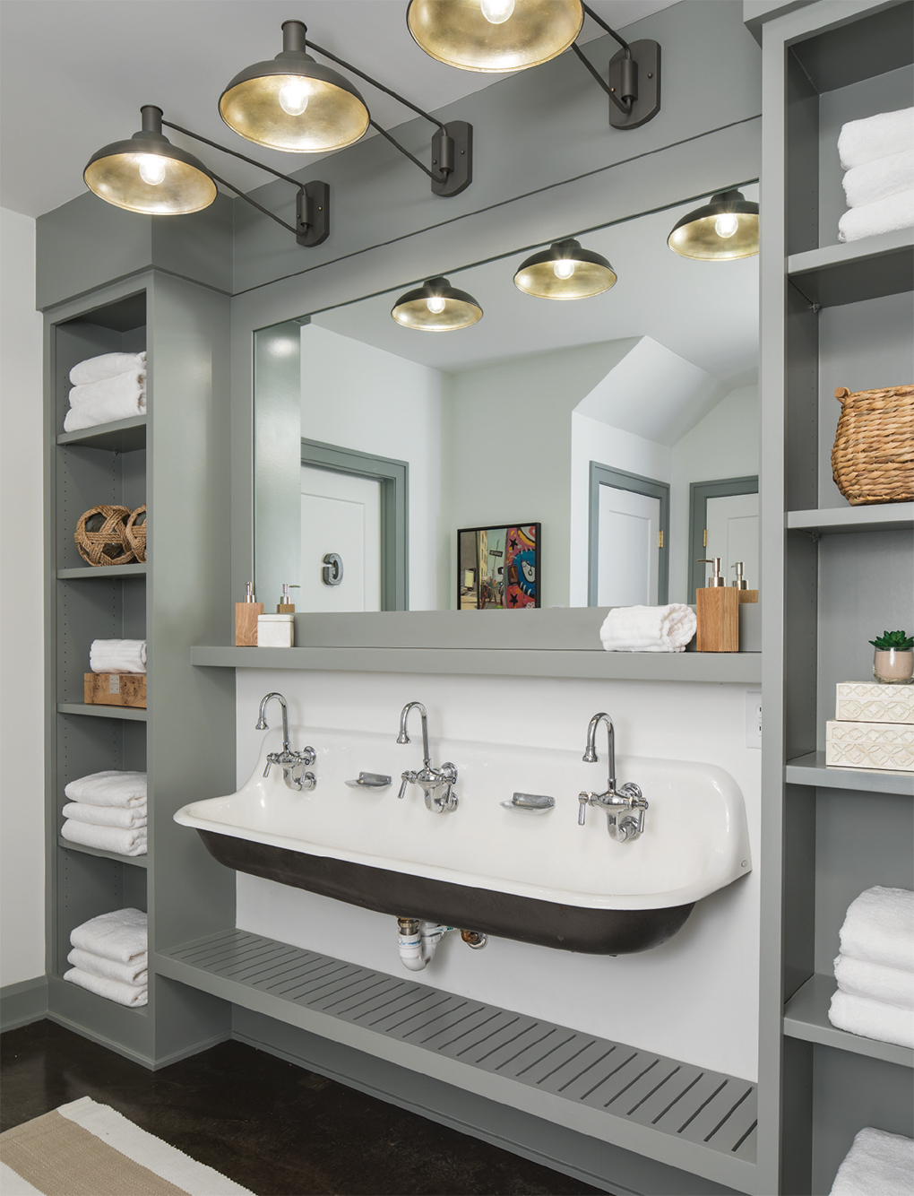 The trough sink gives the kids plenty of elbow room in the basement’s common wash area.