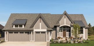 Situated on the edge of the scenic Royal Club championship golf course, the home features a three-car garage and a paver courtyard leading up to the front door. Part of Midwest Home's 2018 Luxury Home Tour.