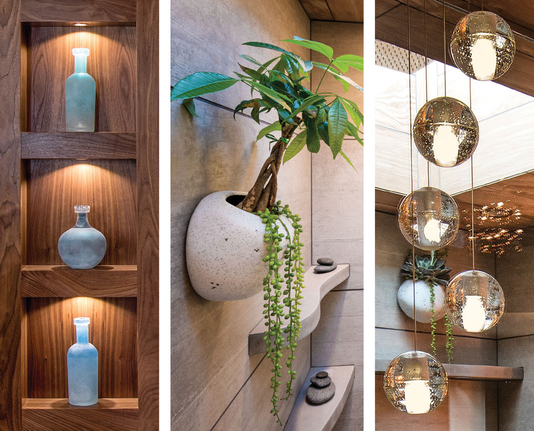 Custom cabinetry, wall planters, and hanging lights add sophistication.