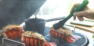 Lobster tails cooking on a Big Green Egg grill